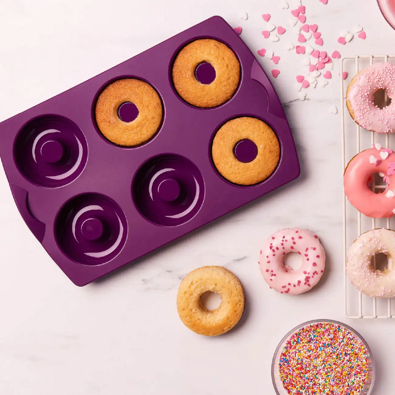 Silikonform Diabolo von der Marke Tupperware / mit idealen Antihafteigenschaften / Donut form / Silikon Backform für Donuts, Bagels, Eierspeisen, Grischiche Ringe und vieles mehr / Hier direkt online kaufen