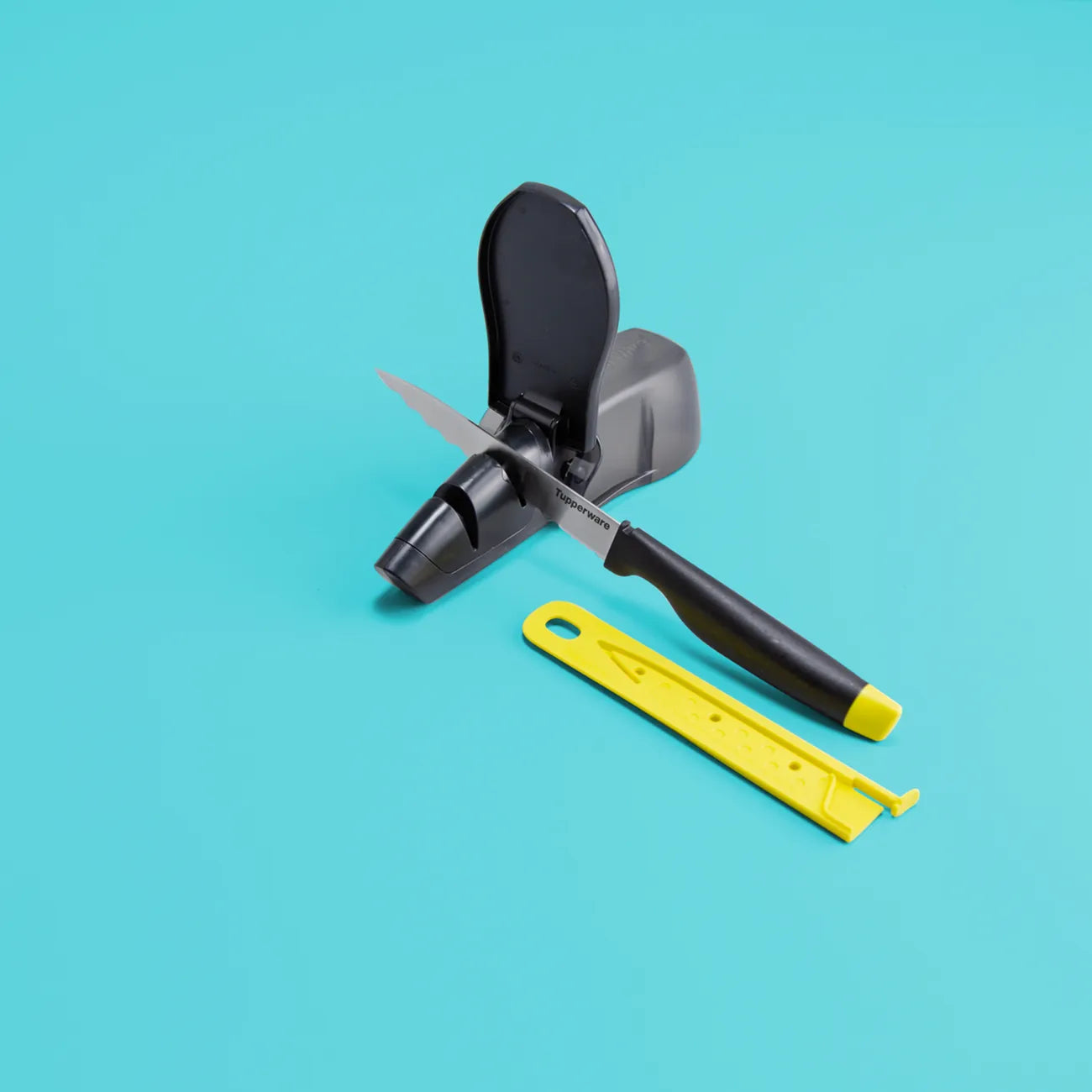 A-Serie Messermaus Schärfmaus Universal von der Marke Tupperware / Messer Schärfer für Messer mit Glattschliff & Wellenschliff / mit austauschbaren Schleifsteinen / Hier direkt online kaufen