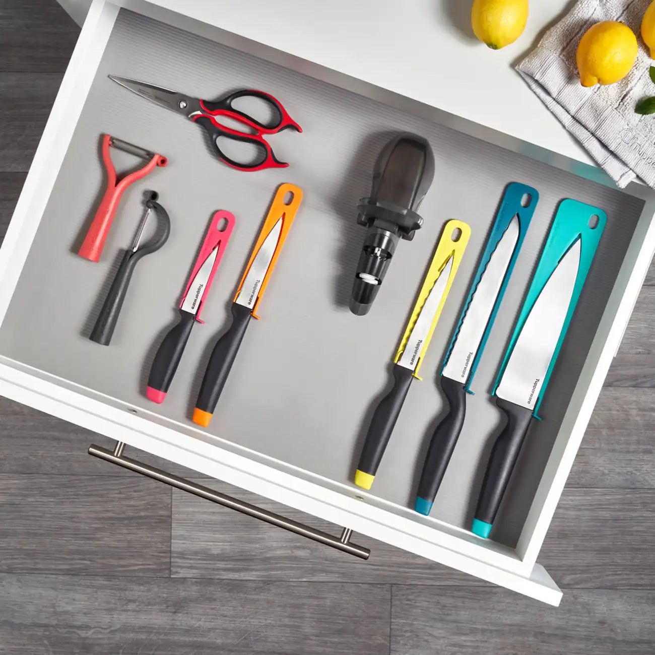 A-Serie Messermaus Schärfmaus Universal von der Marke Tupperware / Messer Schärfer für Messer mit Glattschliff & Wellenschliff / mit austauschbaren Schleifsteinen / Hier direkt online kaufen