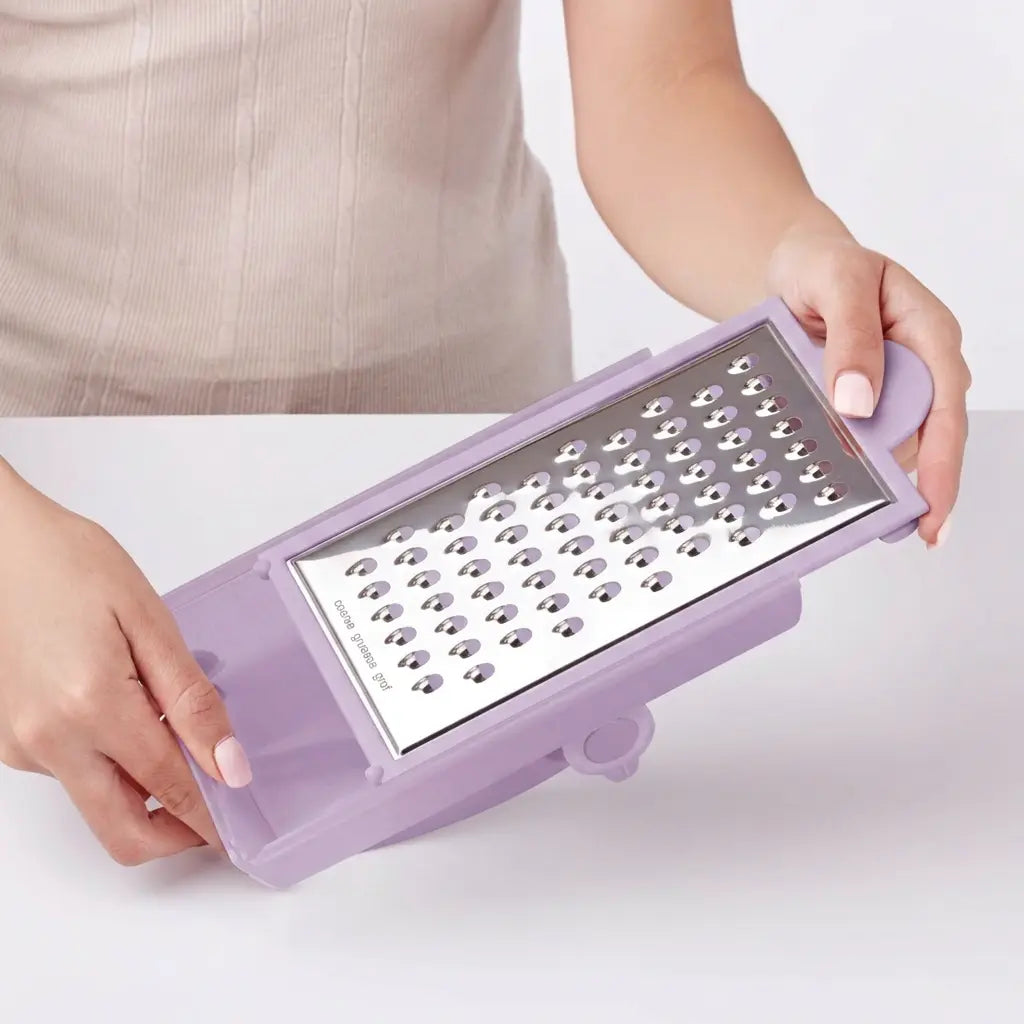 Tupperware Handreibe Grate N Measure 11177880 Die Küche / Handreibe Grate N Measure von Tupperware / Reibe für Käse, Gemüse und Schokolade / mit Auffangbehälter / Material PP & Edelstahl / Farbe Lila / Hier direkt online kaufen