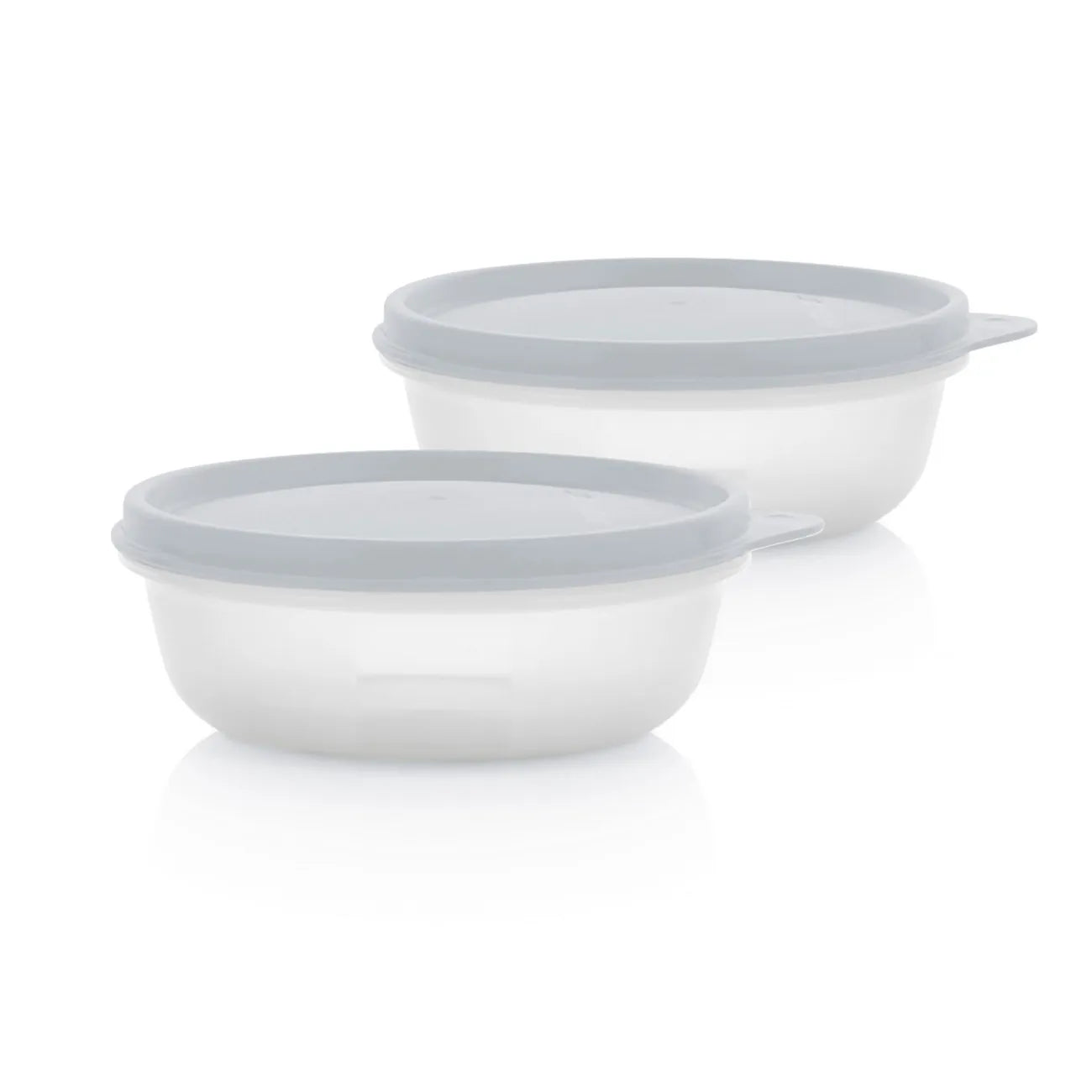 Frische Trio Clarissa Set von der Marke Tupperware / besteht aus 2x 300ml und 1x 1,4l Schüsseln mit Deckel / Ideal zu Vorbereiten und Mitnehmen / Vorbereiten Frischhalten und Servieren / Deckel mit Sicherheitsverschluss schließen Luft und Wasserdicht / Schüsseln bei nicht Verwendung platzsparend ineinander stapelbar / Frischebehälter mit Deckel / Ansicht 2 kleine Behälter von der Seite / Hier direkt online kaufen