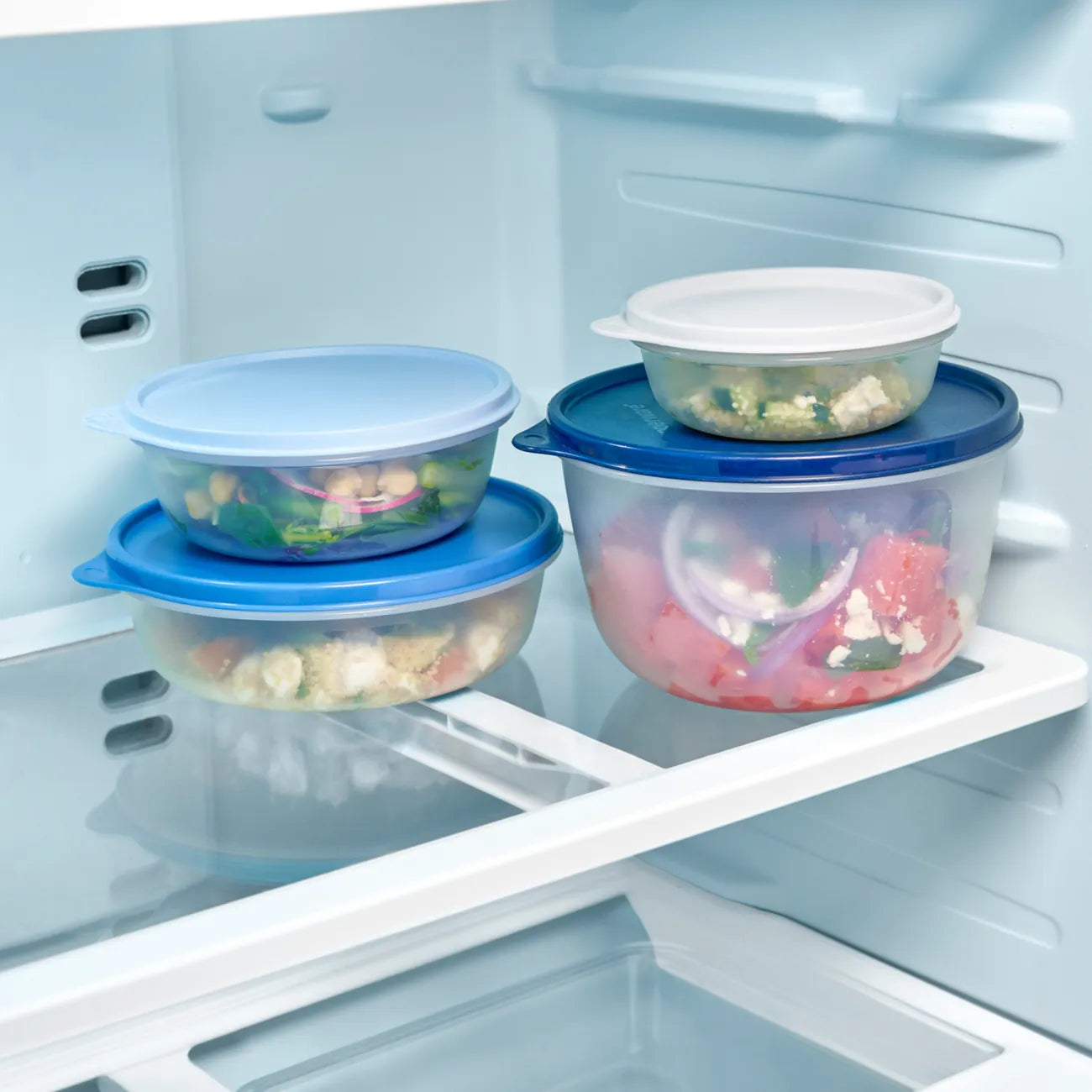 Clarissa Schüssel-Set Frische-Quartett von der Marke Tupperware / Kleine Hitparade Set / 4 praktische Schüsseln / praktische Lasche am Deckel zum Öffnen / ineinander Stapelbar / Frischhalteboxen / Luft und Wasserdichter Deckel / Hier direkt online kaufen