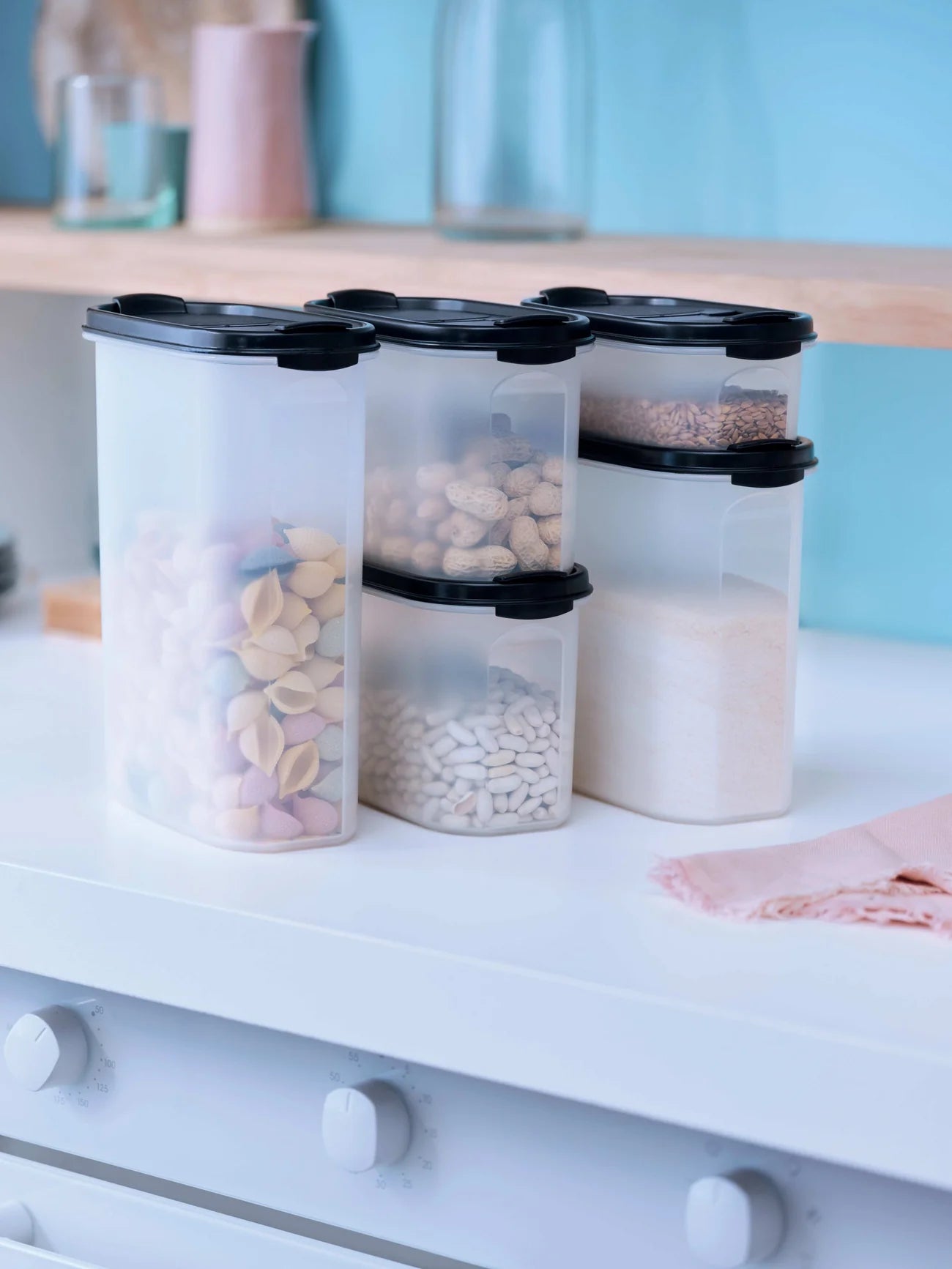 Eidgenosse 2,3 L von der Marke Tupperware / Deckelfarbe Schwarz mit 2 Schüttklappen / oval / mit Transparenten Sichtfenster für mehr Übersicht / runde Form für platzsparende Aufbewahrung / dichtschließender Deckel / modular Stapelbar / Vorratsdose / Lebensmittelaufbewahrung / Hier direkt online kaufen 