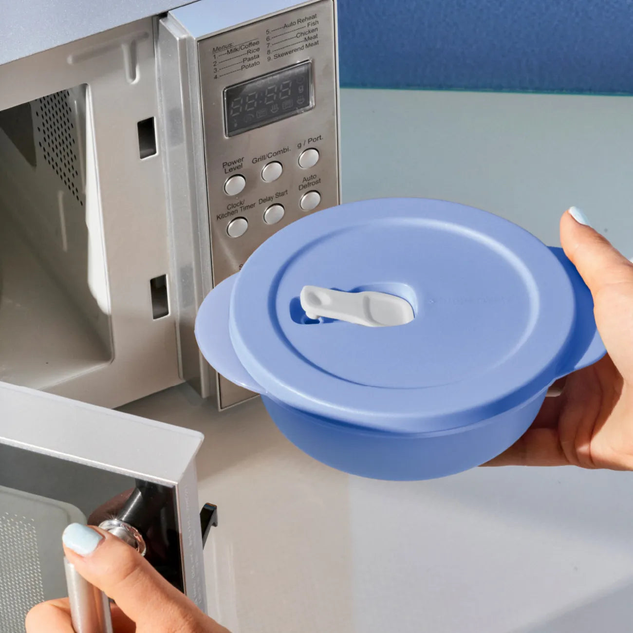 CrystalWave 560ml Mikrowellenbehälter von der Marke Tupperware / in der Farbe Flieder / zum Vorkochen, mitnehmen und aufwärmen / Dichtschließender Deckel mit Ventil / Hier direkt online kaufen
